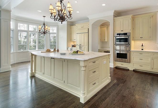 newly installed grey laminate floors in modern kitchen in Lake Forest, CA